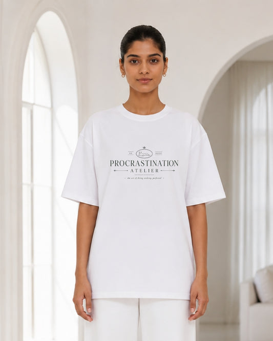 Women's Oversized White "Procrastination Atelier" Graphic T-Shirt – Minimalist Vintage Typography Aesthetic Tee